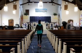 Churches hold Palm Sunday services despite state bans on gatherings