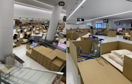 Nhật 'cách ly tại chỗ' khách tới sân bay trong các hộp carton