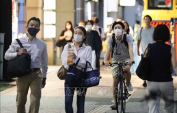 Tokyo, Nhật Bản hạ mức cảnh báo về dịch COVID-19