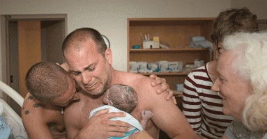 Heartwarming Photo of Two Dads Holding Their Newborn Goes Viral Heartwarming Photo of Two Dads Holding Their Newborn Goes Viral