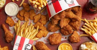 Ở nước ngoài, KFC là đồ ăn rẻ tiền thì ở Việt Nam lại là... “sành điệu“.